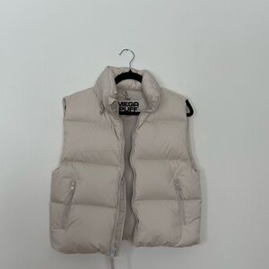 TNA Mega Puff Vest in Cream with Black Logo